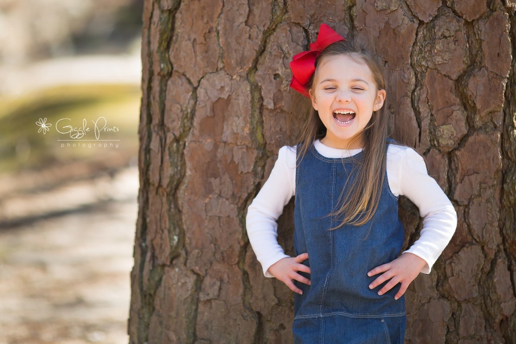 Atlanta Family Photographer - GigglePrints - girl laughter tree red bow